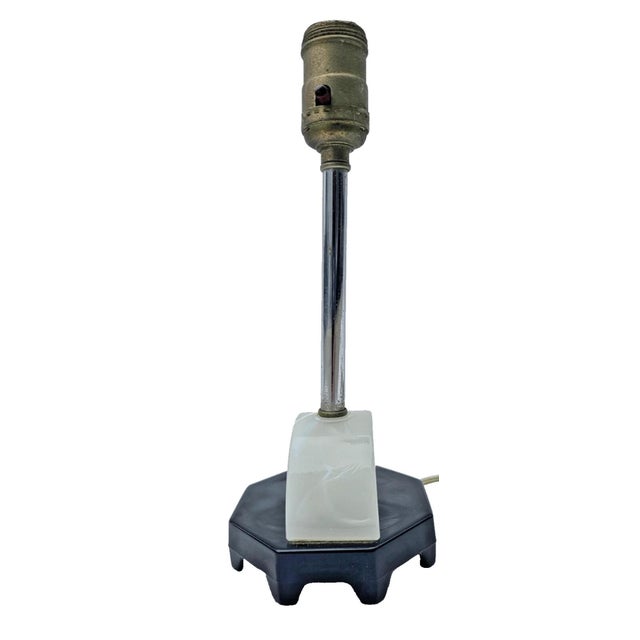 This striking vintage Art Deco lamp, attributed to Globe Specialty Co. of Chicago, beautifully captures the bold black-...