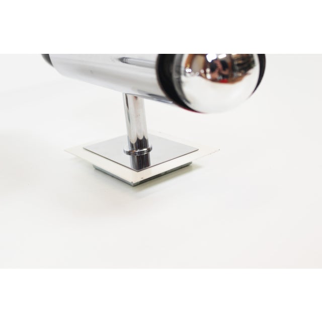 Playful set of space age wall lamps in the style of Gaetano Sciolari. Both in very good condition without damage. The...