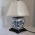Blue & White DIAMOND Shaped Chinoiserie Lamp Decorated With an Asian Landscape Scene Resting On A Wooden Base With Cream...