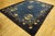 Refined Floral Border on Navy Background and Black Border Antique Chinese Peking Rug For Sale - Image 10 of 10