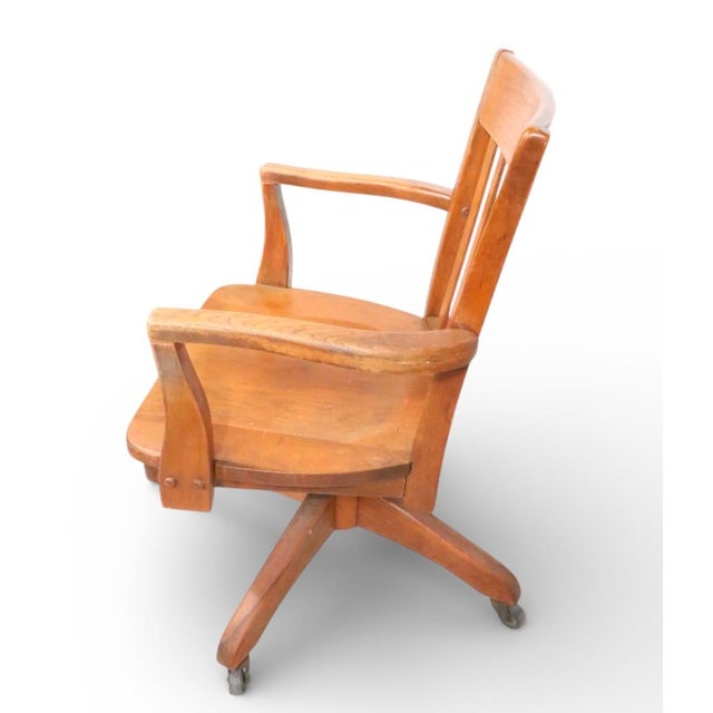 Classic Bank of England, Jury style swivel and tilt, oak desk chair, in very good, clean and ready to use condition. This...