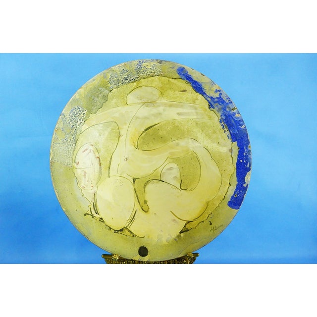 MEASUREMENTS: Diameter: 51 cm; Height: 6 cm; Weight: 2.267 kg Item : Impressive majolica plate, with a monumental diameter...