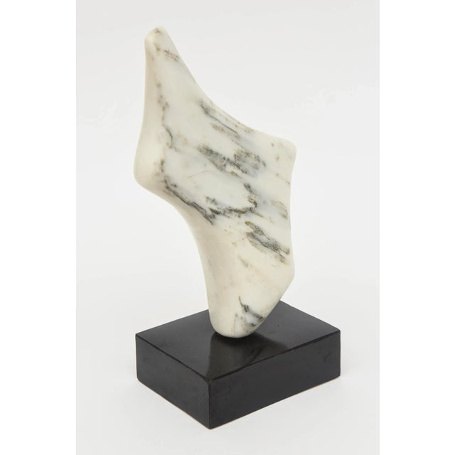This vintage abstract Carrara marble and black resin base sculpture is from the 80's. it is a great tabletop sculpture....
