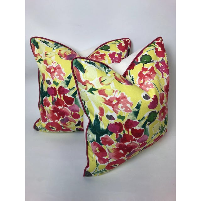 Let the Sunshine in with these bright accent pillows. Floral pink grace this fabric. A contrast pink welt ties them together.