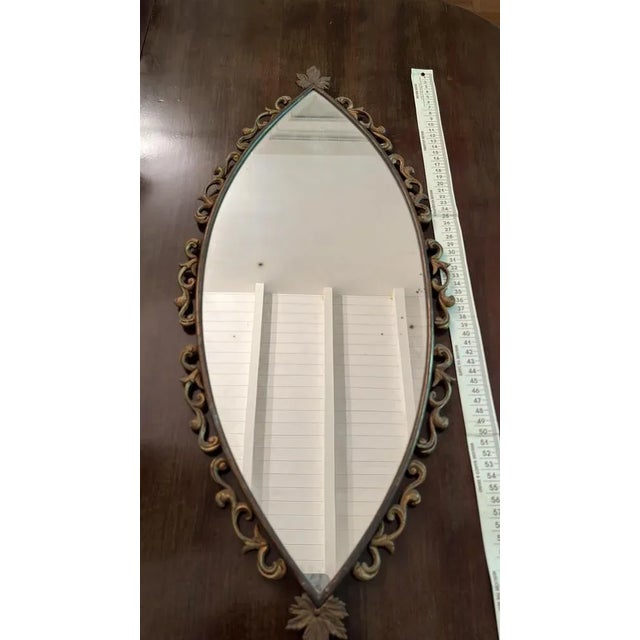 Bronze mirror, Italian production, 1950s Found in a noble apartment, it is intact and in good condition. Small signs of...