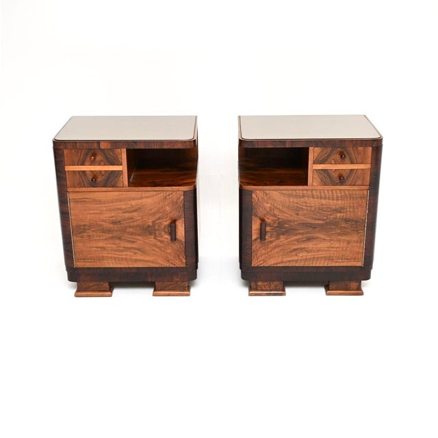 A beautiful pair of French Art Deco walnut bedside cabinets, dating from the 1930’s. The quality is outstanding, they are...