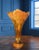 This stunning acrylic vase stands 17 3/4 inches tall, and has a goblet-shaped silhouette that tapers gracefully from its...