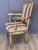 A late 18th century Italian classical armchair, retaining an appealing green painted and parcel-gilt surface. The frame...