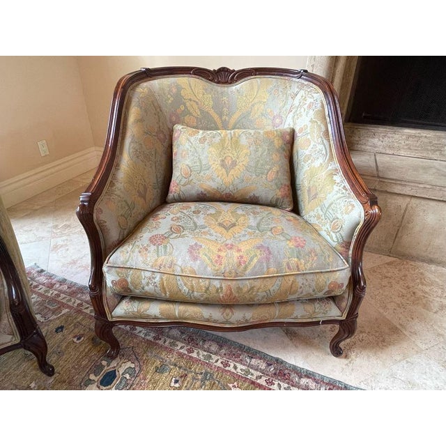 Elegant pair of vintage Henredon bergere chairs in very good used condition. Carved cabriole legs with shell crest. Soft...