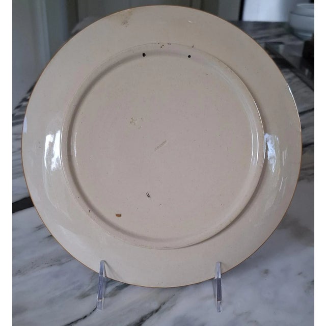 Val's Dollhouse is proud to present this majolica earthenware plate by Minton featuring two figures, possibly of European...