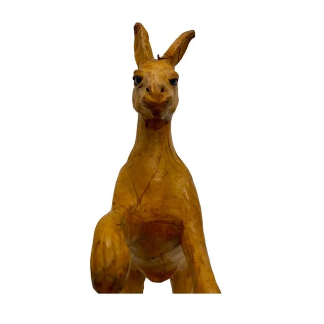 Vintage 13.75” Brown Leather Wrapped Kangaroo Statue. Very good overall preowned condition. Item measures approximately...