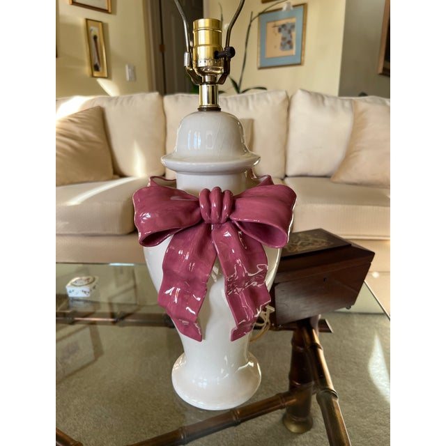 An elegant and increasingly difficult-to-find pair of authentic BetLar Inc. ceramic table lamps, featuring a striking...