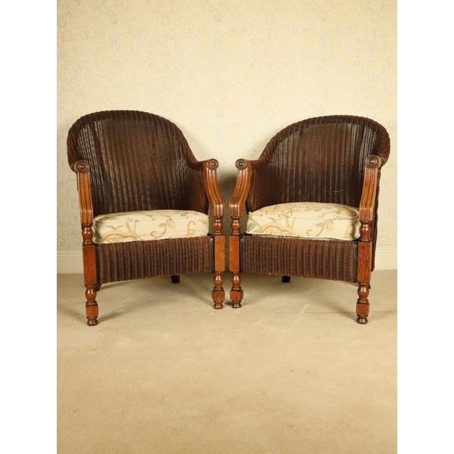 Rare pair of 1930s "zeppelin" lloyd loom armchairs by w. Lusty & sons a rare and historically significant "his and hers"...