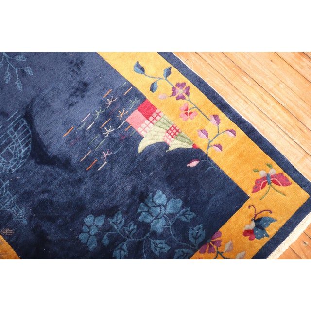 Chinese Nichols art deco scatter size rug from the 2nd quarter of the 20th century. Measures: 3' x 5'