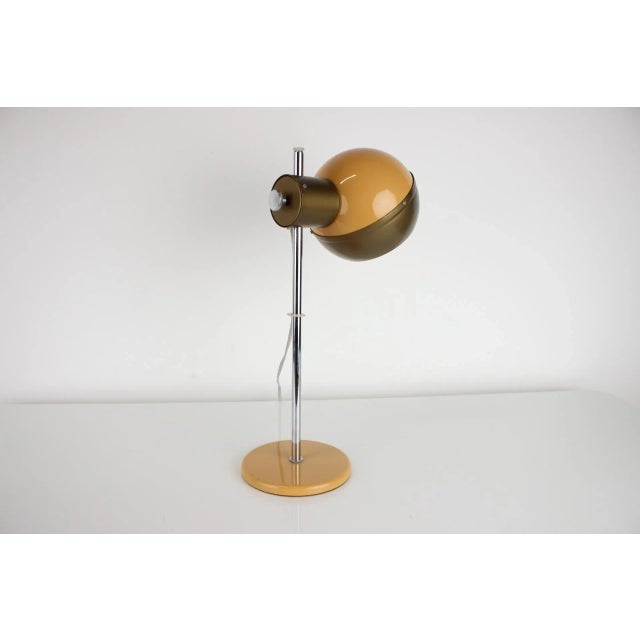 Made in czechoslovakia. Made of lacquered metal, chrome. Adjustable shade. 1x60w,e27 or e26 bulb. Us adapter included....