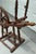 19th Century Spinning Wheel Small antique Saxony style oak spinning wheel. The historical, classic wheel is beautifully...