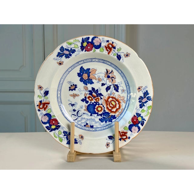 This striking antique platter features a vivid East Asian-inspired Chinoiserie layout in the celebrated Imari palette (or...