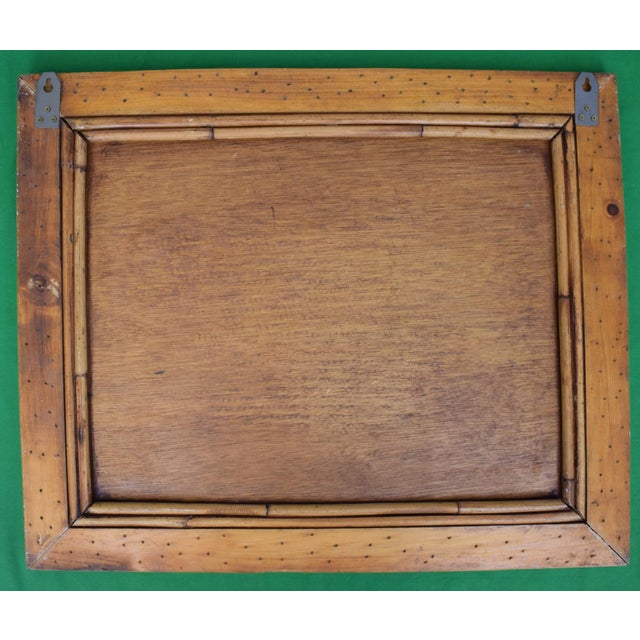 Sz: 19 3/4"H x 24"W x 1"D "Seven Seas Travel" Bulletin Board made of bamboo, woven cane, braiding, and leatherette straps...