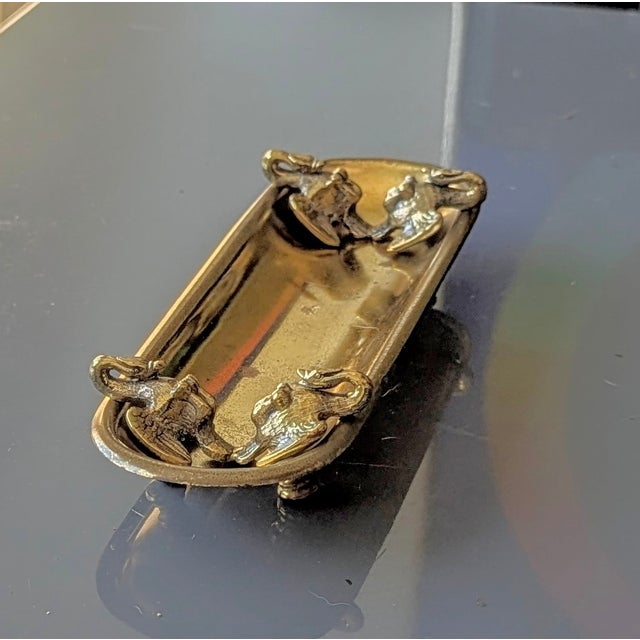 Early 20th century art nouveau flanked by 2 swans foot to foot on each side.