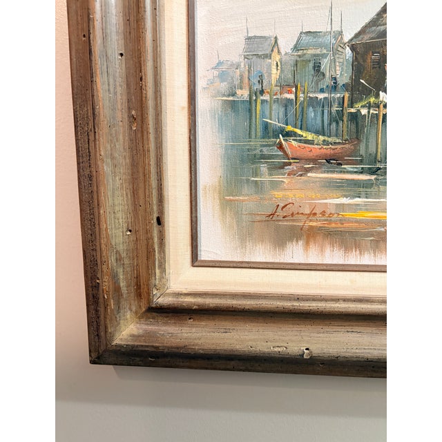 The original oil on canvas work by listed British marine artist Alan Simpson (1941-2007). Known for his atmospheric harbor...