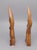 Striking vintage pair of hand-carved wooden abstract sculptures depicting kneeling women. These pieces feature smooth,...