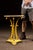 Cast iron conservatory table featuring a circular top supported by three finely cast pierced foliate-form legs terminating...