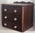A beautifully crafted miniature walnut chest dating to the 1880s, complete with an Eastlake‑style carved backrail and...