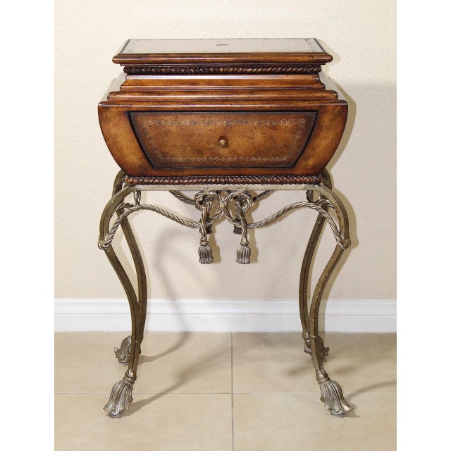Enhance your space with this Maitland Smith vintage gilt steel rope vanity table, a beautifully designed piece that...