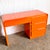 This striking postmodern desk brings bold personality and sculptural presence to any interior. Wrapped in a vibrant...