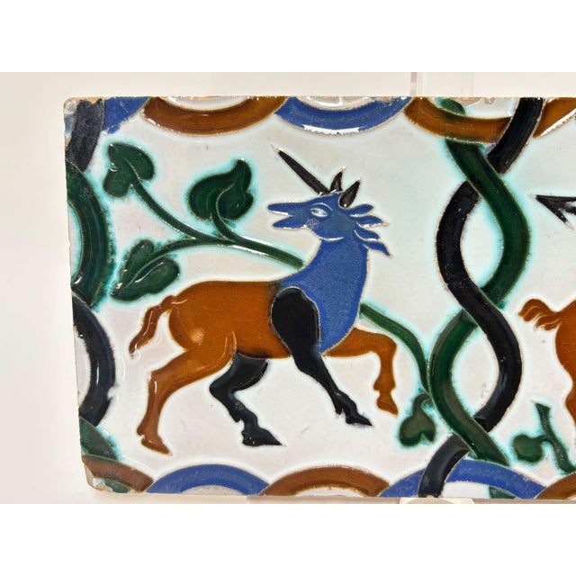 Ramos Rejano Seville Azulejo Tile with Unicorn and Centaur Archer, Hispano-Moresque, Early 20th Century A rare and highly...