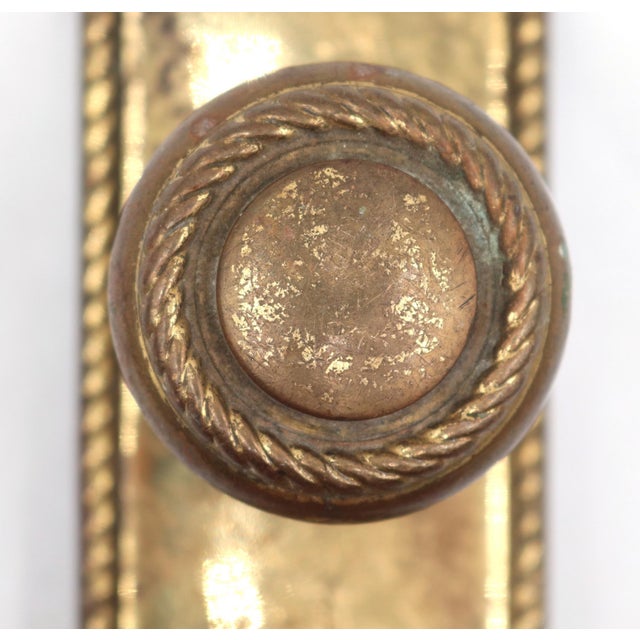 Traditional style privacy door knob set made of polished brass for the interior. The original mounting screws are not...