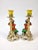This pair of porcelain candle holders are intricately hand painted in fine detail.
