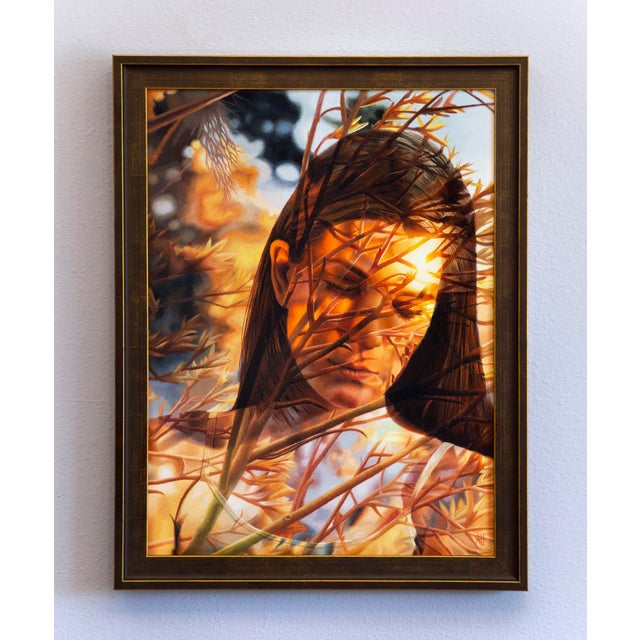 The artwork features a contemplative figure partially obscured by delicate foliage, creating an intricate interplay...