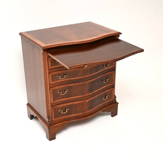 A smart and useful antique Georgian style chest of drawers. This was made in England, it dates from around the 1930-50’s....