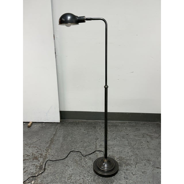 Design Plus Gallery presents the Kinetic Floor Lamp from Robert Abbey. Presented in a deep patina bronze tone, the lamp...