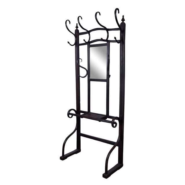 Antique bentwood hall tree, circa early 20th century. This antique hall tree is crafted in bentwood. Bentwood is a process...