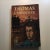 A Thomas I'Imposteur Jean Cocteau book that has some shelf and edge wear. Cover very slightly loose at spine. Pages clean....
