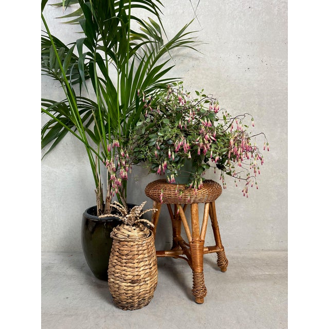 Vintage rattan stool / side or plant table. Boho / Ibiza style. Stands stably. In beautiful condition. Photos are part of...
