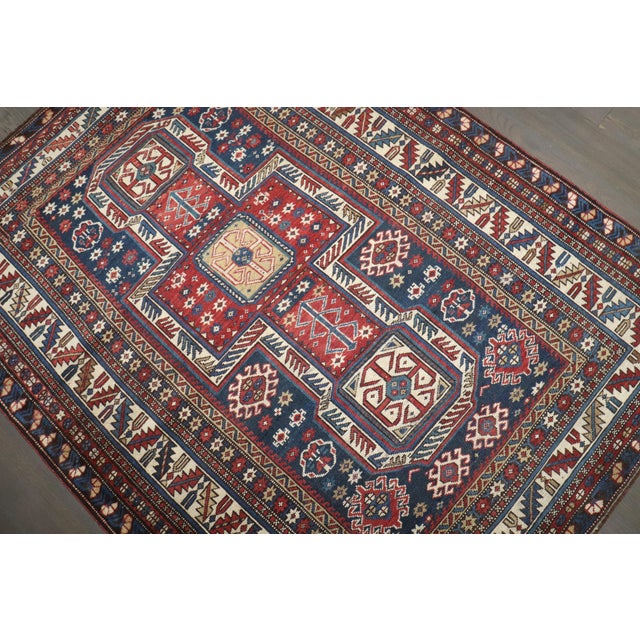 a late 19th century Caucasian Shirvan Rug with an infamous keyhole motif Details rug no. j3923 size 3' 8" x 4' 9" (112 x...