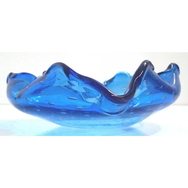 Murano blue three sided bullicante bowl is a stunning shade of deep azure turqoise blue with a scalloped rim. 5 x 5 x 5 x...
