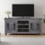 Dimensions: 69" W x 18" D x 32" H Give your home a grand and stately feel with this majestic two-door media console that...