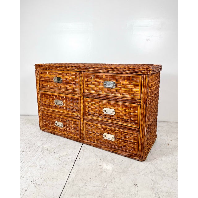 Vintage woven rattan wicker 6 drawer dresser. Thick woven pencil reed with twisted reed trim. Campaign style metal...