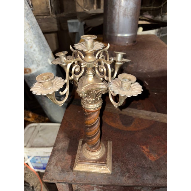 Vintage candlebra, holds 5 Part brass and wood. It also says Dilly MFG. Co. Made in USA on the very bottom