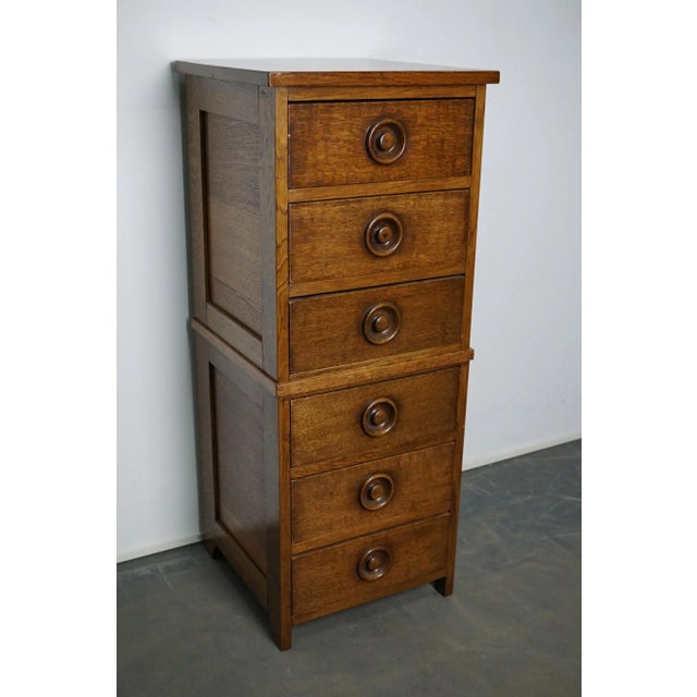 This apothecary cabinet was made circa 1930s in England. It features 6 drawers with nice handles. It is made from oak and...