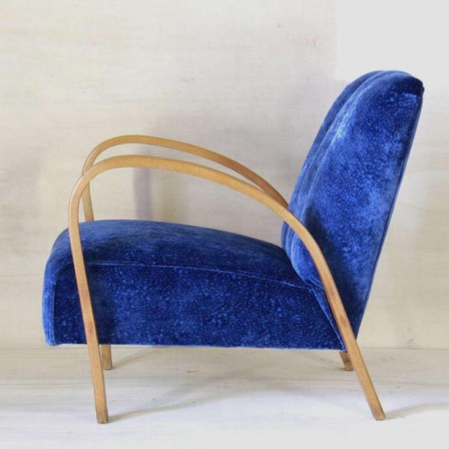 Blue Velvet Art Deco Armchair, France 1920s Art Deco armchair from 1920s France showcases an electric blue fabric and a...