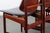 This is a set of four dining side chairs in teak wood made by Arne Hovmand Olsen, Denmark circa 1950. They are classic and...