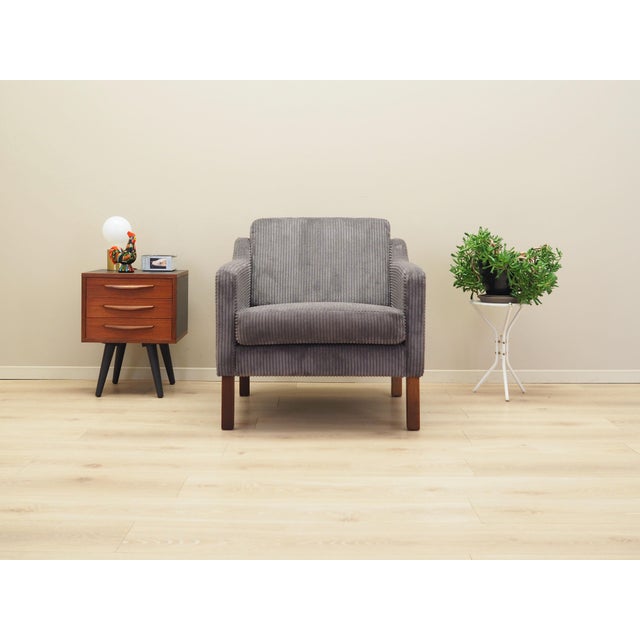 The armchair was made in the 1970s, Danish production. The structure is made of solid wood. Legs made of beech wood. Wood...