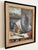This lovely vintage French oil painting features a still life scene from what's likely a kitchen countertop where a tall...