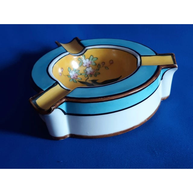 This beautiful 1891 to 1921 hand painted Pheonix in flowering tree has 3 rests, spaced around the ashtray. Wonderful use...