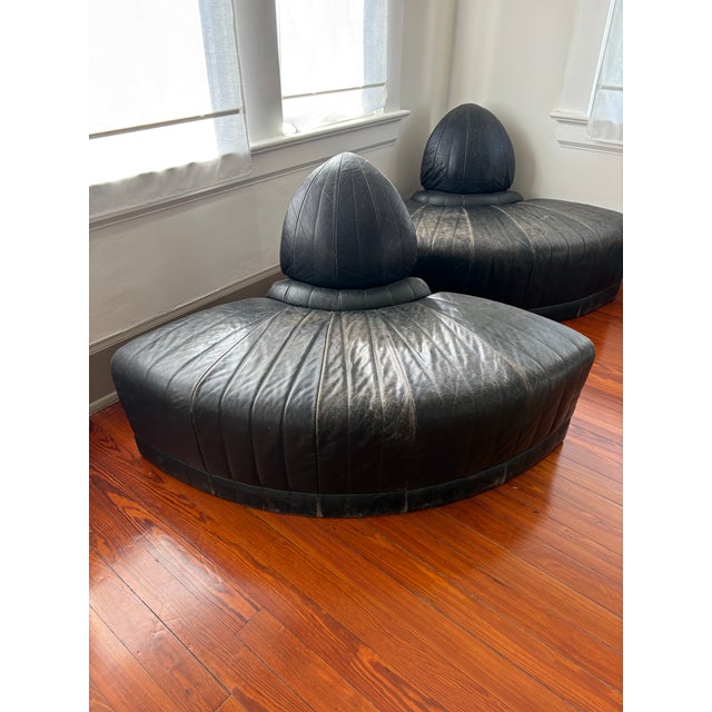 Gorgeous and super rare to come by! Post modern leather rounded chairs by Roche Bobois. The original Roche Bobois labels...